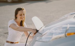 7woman-charging-electro-car-electric-gas-station-2